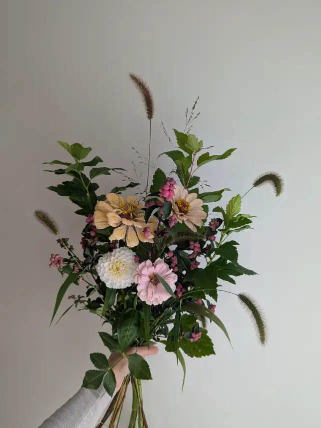Loose seasonal bouquet with soft pink, cream and green flowers